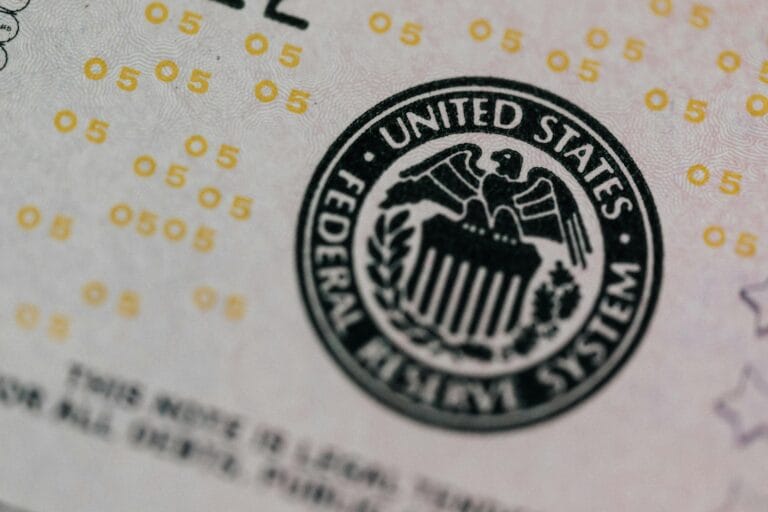 Detailed macro shot of the United States Federal Reserve System seal on paper currency.
